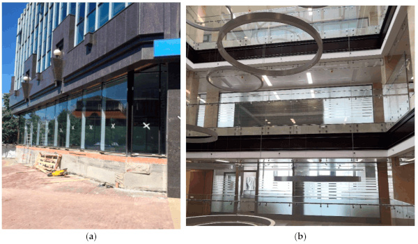 Figure 1. Business center “Chelyabinsk City”: (a) facade and (b) smoke-proof all-glass screen in the atrium. Photo by the authors.