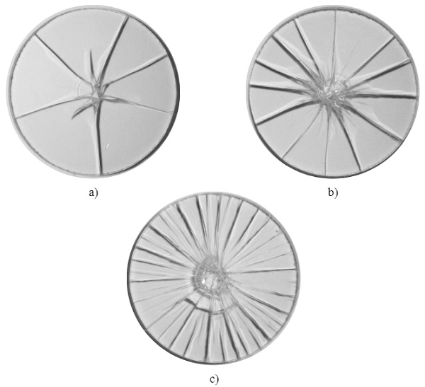 Fig. 8 Representative fracture patterns obtained from the experiments tested with a target piston velocity of 1.7∙10-3mm/s (quasi-static loading rate). The determined fracture strengths are a) σf= 89 MPa, b) σf= 135 MPa, and c) σf= 259 MPa. (from Bønding and Meyland (2017)).