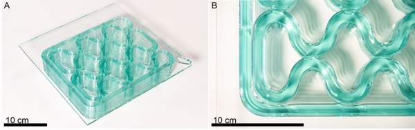 Fig. 9:   A) Cellular fill printed on 6.4 mm Optifloat float glass B) Detail view of extruded glass fusion between adjacent beads.