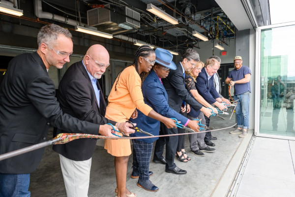 On the Vitro Patio, PGC partners and supporters cut a hot glass ribbon to commemorate the completion of PGC’s historic expansion.