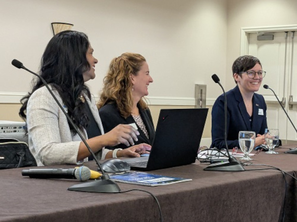 Katy Devlin (right) presents Market Factors to Watch in 2025, alongside Urmilla Sowell (left) and Karen Wegert.