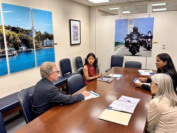 NGA's Tom Culp and Urmilla Sowell, and Laurie Purpuro, government affairs advisor, K&L Gates, meet with Isabelle Zhan from the office of Senator Gary Peters (D-MI).