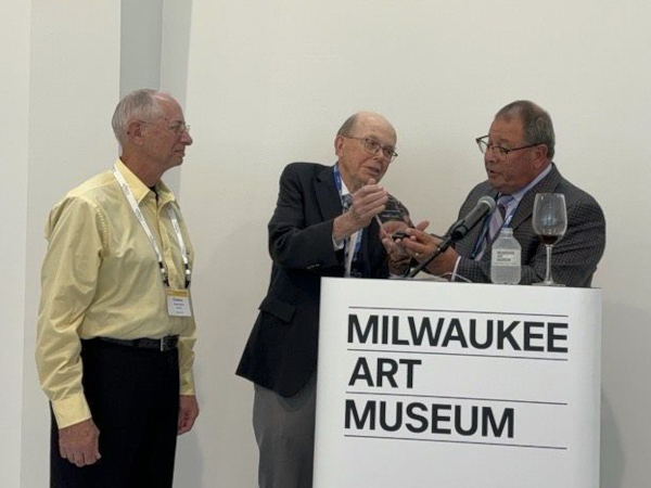 (l-r) Chuck Wencl receives award from Stanley Joehlin & Ren Bartoe