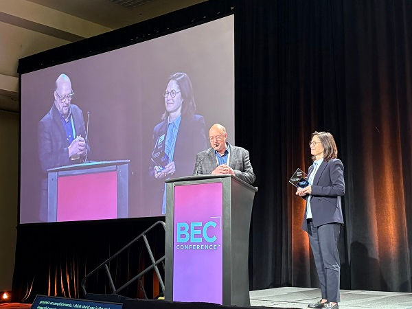 Ricke Locke Presents NGA's First Business Leadership Award to Nicole Harris During BEC Conference