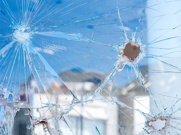 Laminated Security Glazing and Ballistic Assault: Standards and Performance Laminated Security Glazing and Ballistic Assault: Standards and Performance