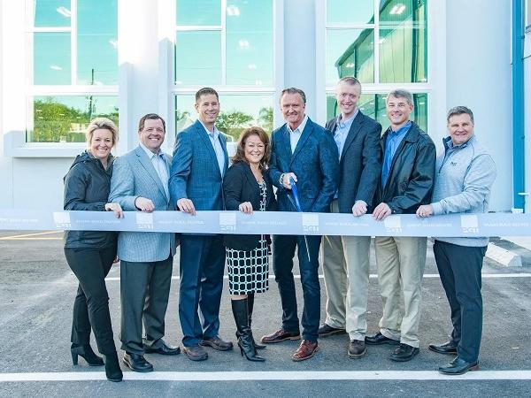 From left to right: Danielle Mikesell, Brad West, Bob Keller, Debbie LaPinska, Jeff Jackson, John Engelstad, Dave McCutcheon and Brent Boydston at the ribbon-cutting ceremony on Jan. 29 (Photo: Business Wire)