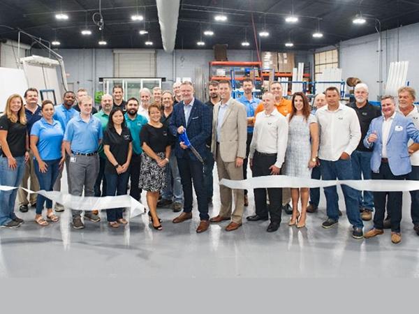 PGT Innovations executives with iLab staff at the ribbon-cutting ceremony inside the new iLab. (Photo: Business Wire)