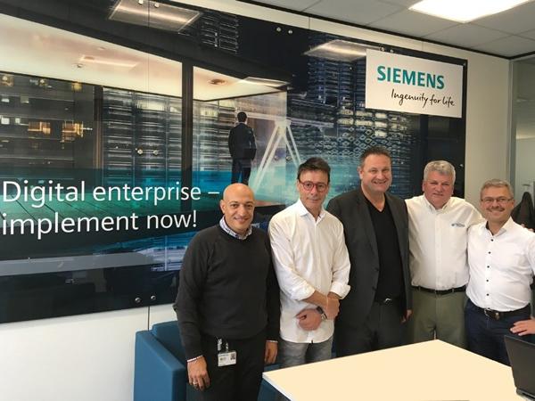 From left to right: Magdi El-Awdan (Siemens), Horst Mertes (FeneTech), Heinz-Josef Lennartz (Siemens), Ron Crowl (FeneTech), and Bernd Lehmann (Siemens).