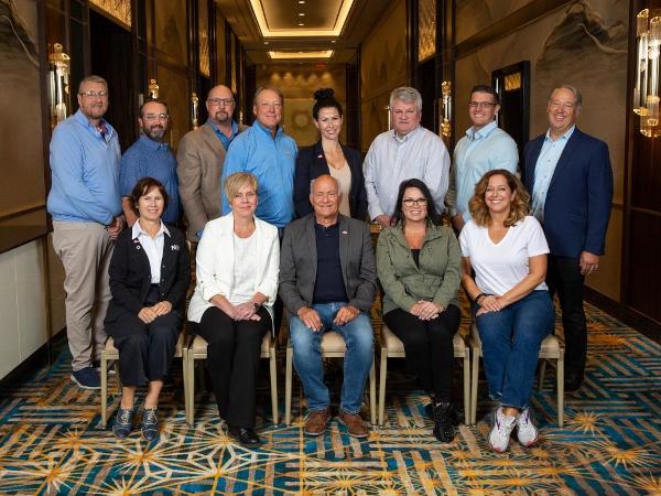 (From back, left to right) Jim Stathopoulos, Courtney Little, Rick Locke, Tim Kelley, Tara Brummet, Ron Crowl, Silas Koonse, Kyle Sword, Nicole Harris, Jodi Martinez, Guy Selinske, Denise Bardwell Baker, Syndi Sim (not pictured, Brian Hale).