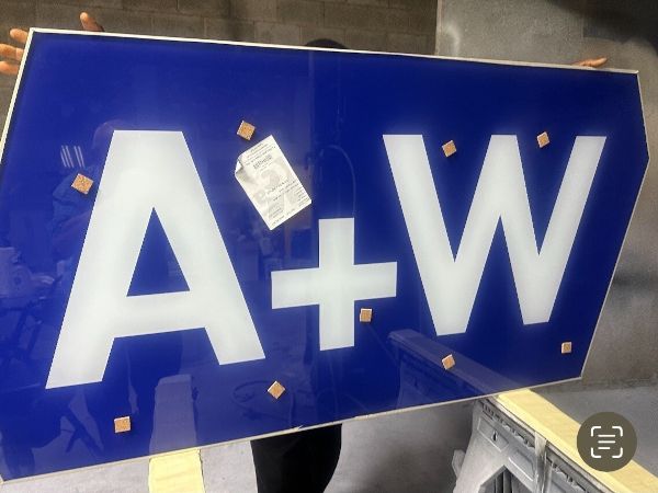 When Design Meets Precision: The A+W Logo in Glass When Design Meets Precision: The A+W Logo in Glass